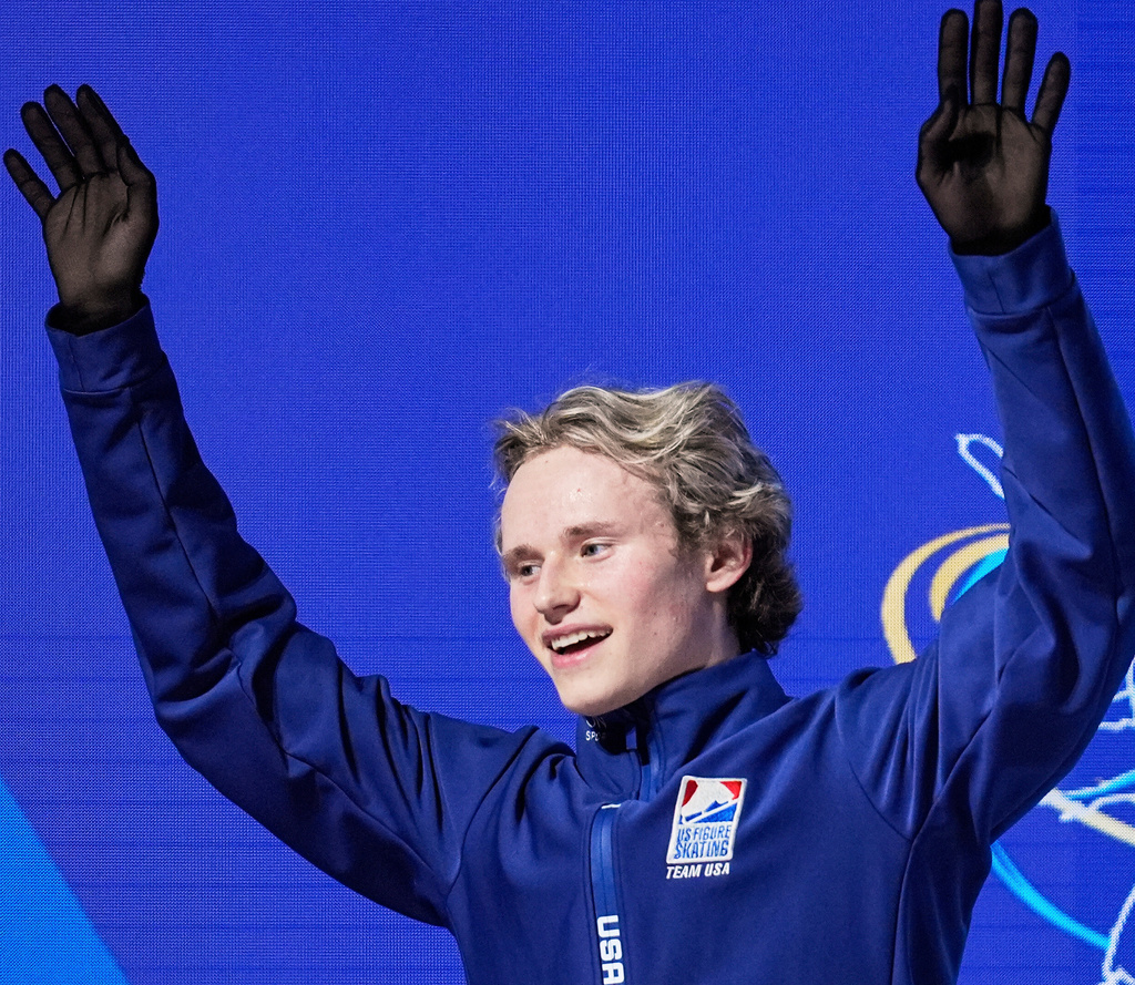 FILE - Ilia Malinin, of the United States, reacts after performing during the men's free skating program at the figure skating world championships, March 29, 2025, in Boston. (AP Photo/Charles Krupa)