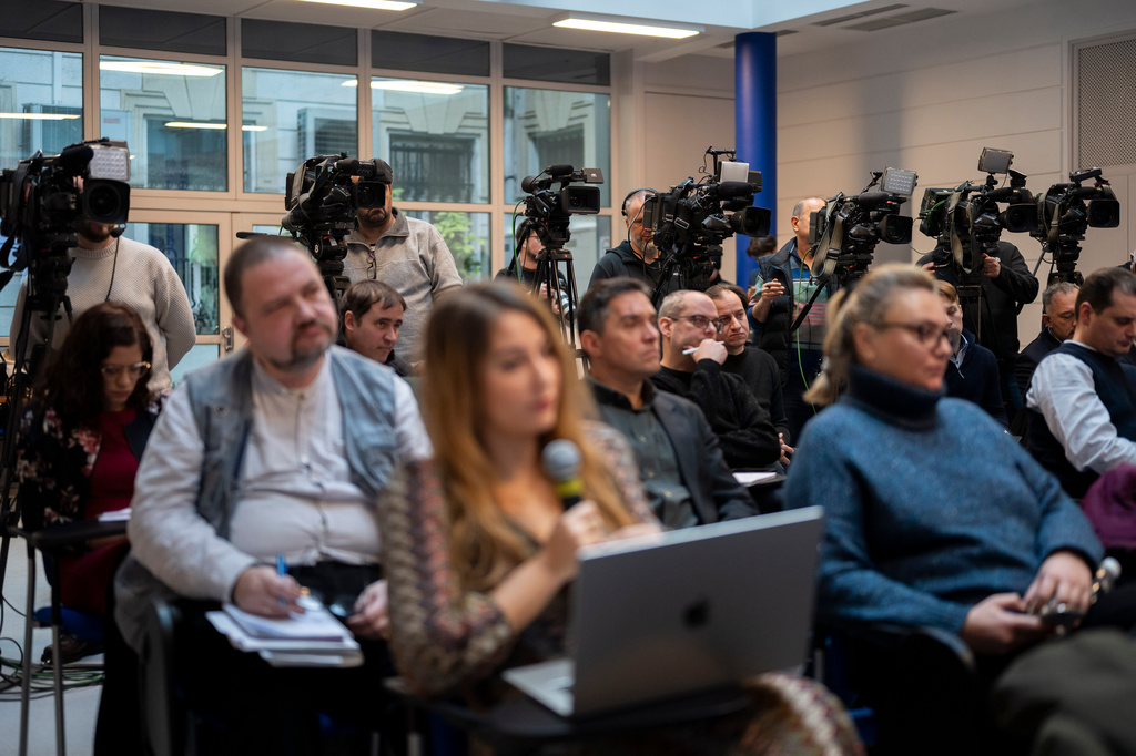 FILE - Members of the media work during the government's press conference on Thursday, Jan 18, 2024. In Hungary, Prime Minister Viktor Orb&aacute;n has extended his party's control over the media, directly affecting informed democratic participation. (AP Photo/Denes Erdos, File)