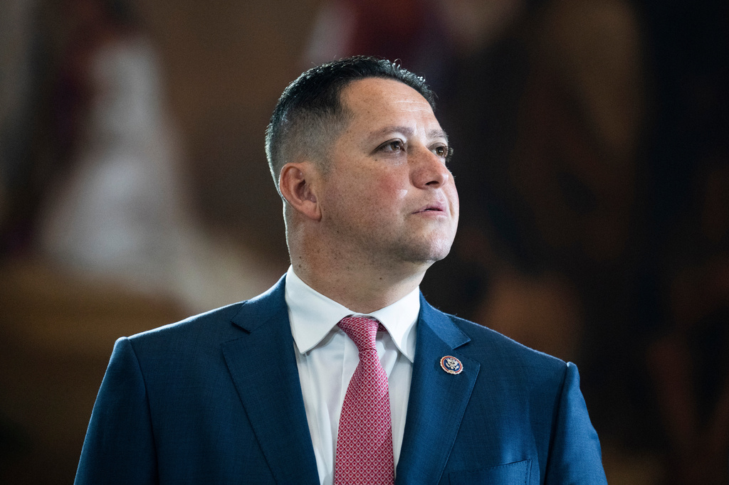 FILE - Rep. Tony Gonzales, R-Texas, is seen before the flag-draped casket bearing the remains of Hershel W. "Woody" Williams lies in honor in the U.S. Capitol, July 14, 2022, in Washington. (Tom Williams/Pool photo via AP, File)