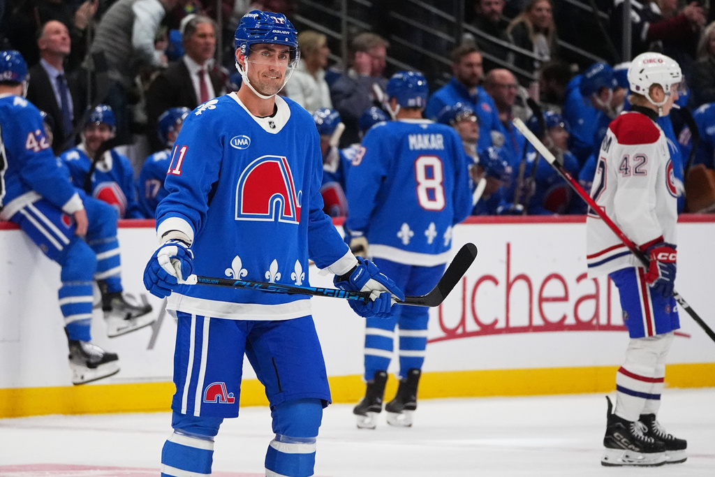 Colorado Avalanche center Brock Nelson reacts after scoring a goal in the second period of an NHL hockey game against the Montreal Canadiens Saturday, Nov. 29, 2025, in Denver. (AP Photo/David Zalubowski)