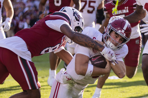 South Carolina defensive back Judge Collier (8) stops Alabama quarterback Ty Simpson (15) during the first half of an NCAA college football game, Saturday, Oct. 25, 2025, in Columbia, S.C. (AP Photo/Scott Kinser) South Carolina defensive back Judge Collier (8) stops Alabama quarterback Ty Simpson (15) during the first half of an NCAA college football game, Saturday, Oct. 25, 2025, in Columbia, S.C. (AP Photo/Scott Kinser)