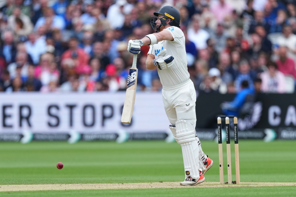 New Zealand's Glenn Phillips plays a shot during the fourth day of the Test match between England and New Zealand at Lord's cricket ground in London, Sunday, June 7, 2026. (AP Photo/Kirsty Wigglesworth)
