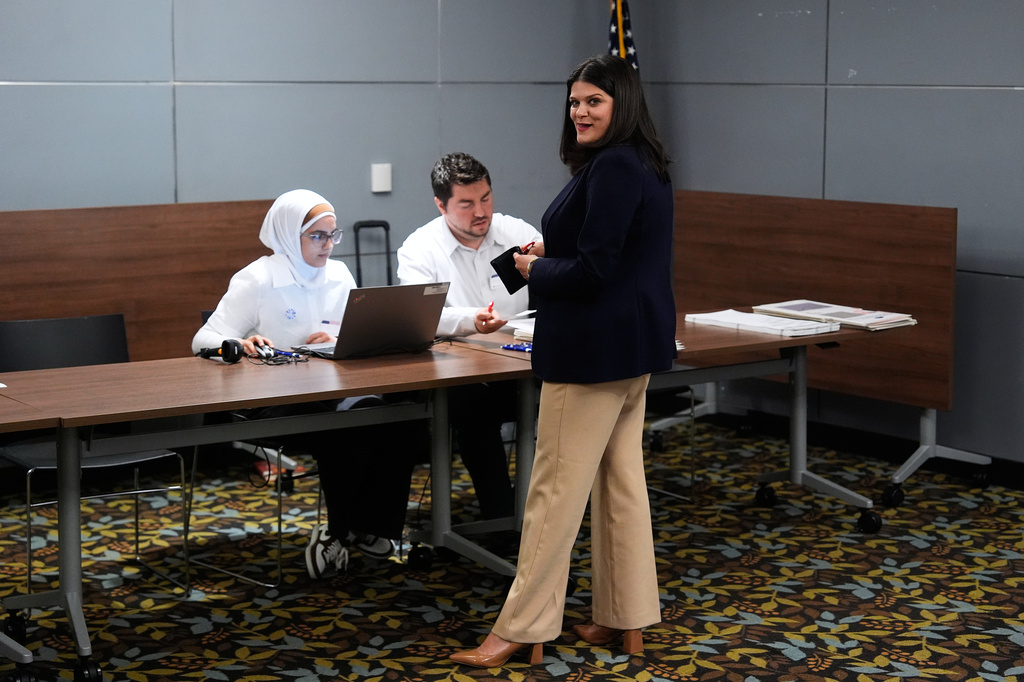 Rep. Haley Stevens, D-Mich., a candidate in the Democratic primary for U.S. Senate in Michigan, votes at the Baldwin Public Library, Tuesday, Aug. 4, 2026, in Birmingham, Mich. (AP Photo/Paul Sancya)
