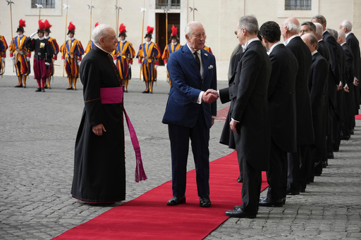 Britain's King Charles III and Queen Camilla arrive in the St. Damasus Courtyard at the Vatican for a state visit, where they will meet with Pope Leo XIV and pray with him in the Sistine Chapel, Thursday, Oct. 23, 2025. (AP Photo/Andrew Medichini) Britain's King Charles III and Queen Camilla arrive in the St. Damasus Courtyard at the Vatican for a state visit, where they will meet with Pope Leo XIV and pray with him in the Sistine Chapel, Thursday, Oct. 23, 2025. (AP Photo/Andrew Medichini)