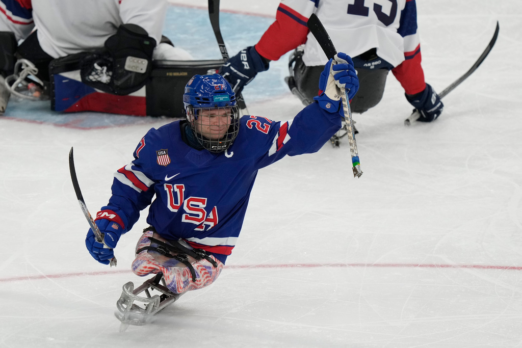 United State's Josh Pauls celebrates after scoring a goal during a semifinal hockey match between United States and Czech Republic at the 2026 Winter Paralympics, in Milan, Italy, Friday, March 13, 2026. (AP Photo/Luca Bruno)