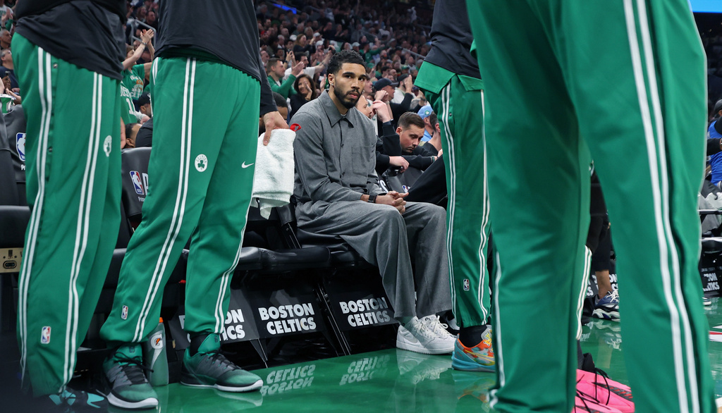 Boston Celtics' Jayson Tatum, who is injured and not playing in the game is on the bench during the first quarter of Game 7 in a first-round NBA basketball playoffs series vs. the Philadelphia 76ers Saturday, May 2, 2026 in Boston. (AP Photo/Jim Davis)
