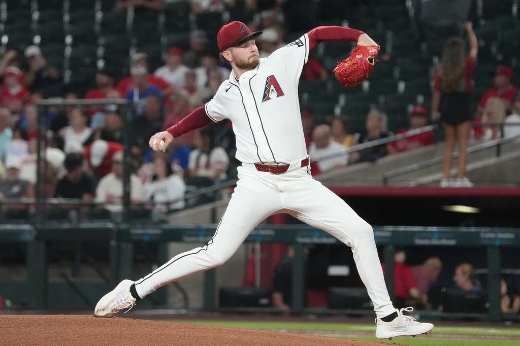 Arizona Diamondbacks pitcher Ryne Nelson throws against the Los Angeles Angels in the first inning of a baseball game, Monday, June 15, 2026, in Phoenix. (AP Photo/Rick Scuteri)