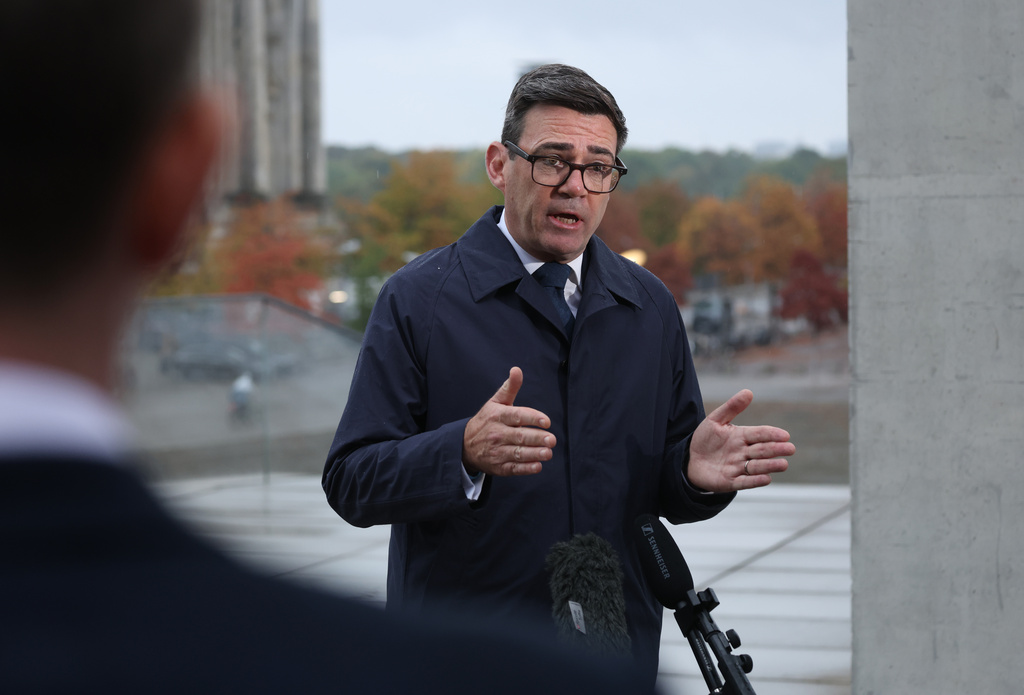 Britain's Prime Minister Andy Burnham gives a television interview following his meeting with German Chancellor Friedrich Merz in Berlin, Germany, Thursday, Oct. 8, 2026. (Sean Gallup/Pool Photo via AP)