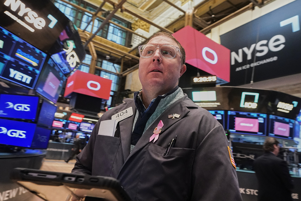 Trader Ryan Falvey works on the floor of the New York Stock Exchange, Tuesday, Feb. 3, 2026. (AP Photo/Richard Drew)