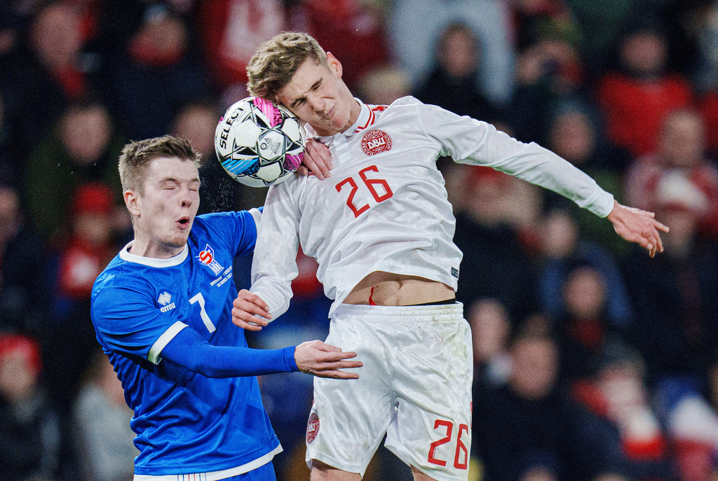 FILE - Denmark's Elias Jelert, right, and the Faroe Islands' Petur Knudsen battle for a head ball during an international friendly soccer at Broendby Stadium, Tuesday, March 26, 2024, in Copenhagen, Denmark. (Liselotte Sabroe/Ritzau Scanpix via AP, File)