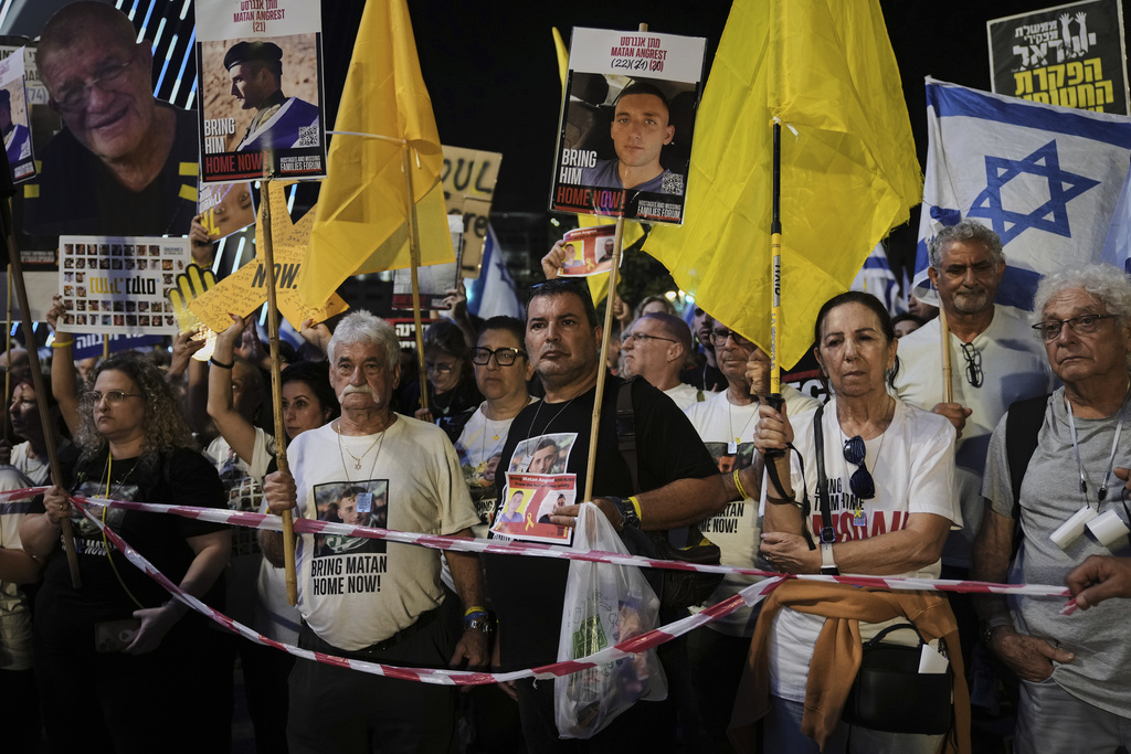 Relatives and supporters of Israeli hostages held in the Gaza Strip attend a rally demanding their release from Hamas captivity and calling for an end to the war, in Jerusalem, Saturday, Sept. 6, 2025. (AP Photo/Mahmoud Illean)