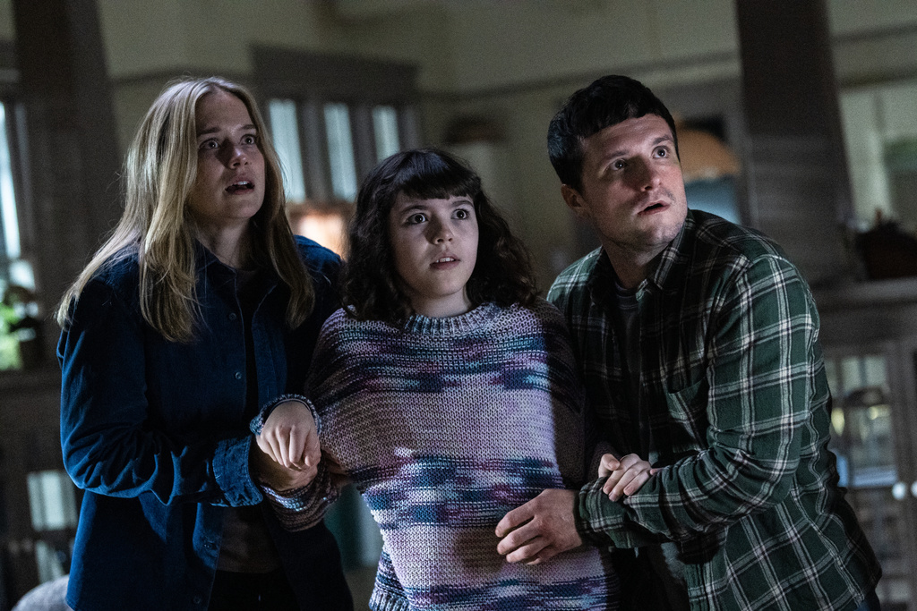 This image released by Universal Pictures shows Elizabeth Lail, from left, Piper Rubio, and Josh Hutcherson in a scene from "Five Nights at Freddy's 2." (Universal Pictures via AP)