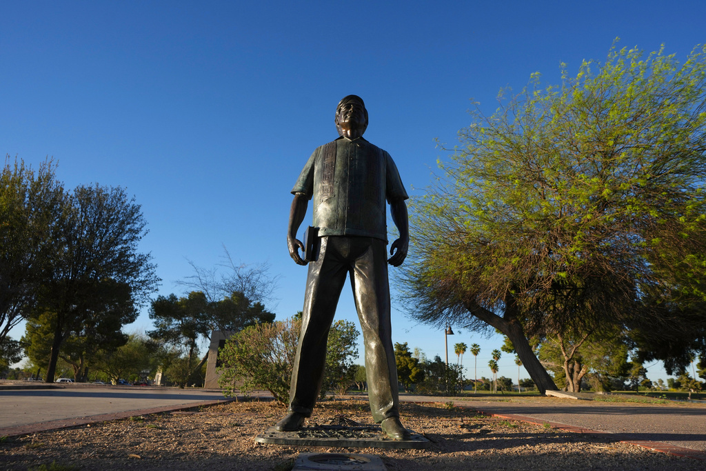 A statute of César Chavez stands in the middle of a plaza at Cesar Chavez Park, honoring the United Farm Workers union founder, Wednesday, March 18, 2026, in Laveen, Ariz. (AP Photo/Ross D. Franklin)