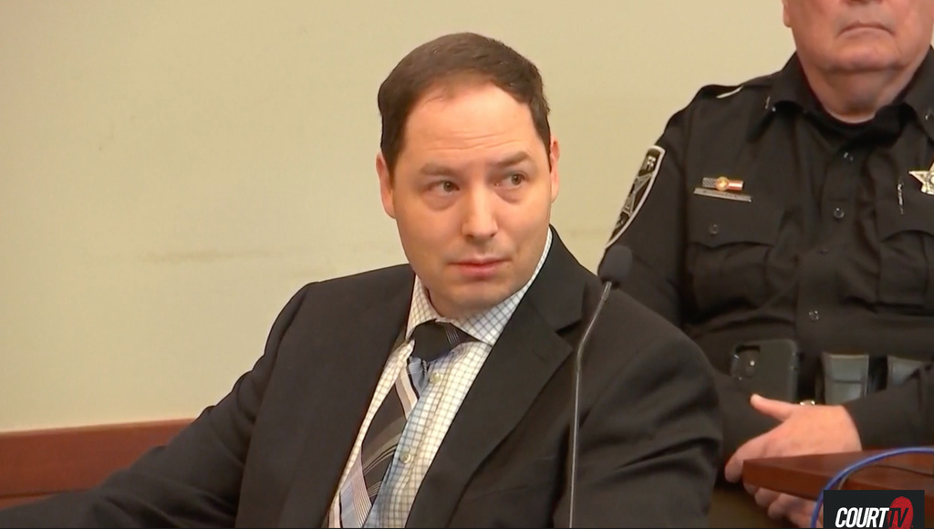 This image taken from video, Brendan Banfield, charged with aggravated murder in the 2023 killings of Christine Banfield and Joseph Ryan, appears in court during opening statements on Tuesday, Jan. 13, 2026 in Fairfax, Va. (Court TV via AP, Pool).