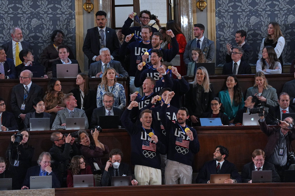 Members of the United States' Olympic hockey team attend as President Donald Trump delivers the State of the Union address to a joint session of Congress in the House chamber at the U.S. Capitol in Washington, Tuesday, Feb. 24, 2026. (AP Photo/Matt Rourke)