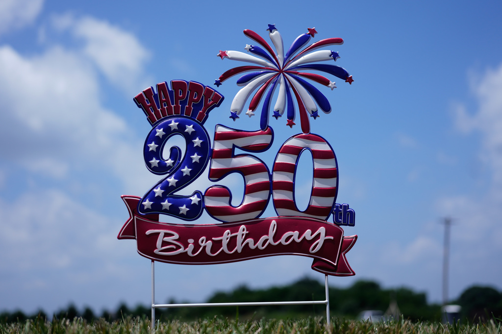 A "Happy 250th Birthday" signs seen near the entrance at Lucky Patriot Fireworks in Batavia, Ohio, Tuesday, June 30, 2026. (AP Photo/Carolyn Kaster)