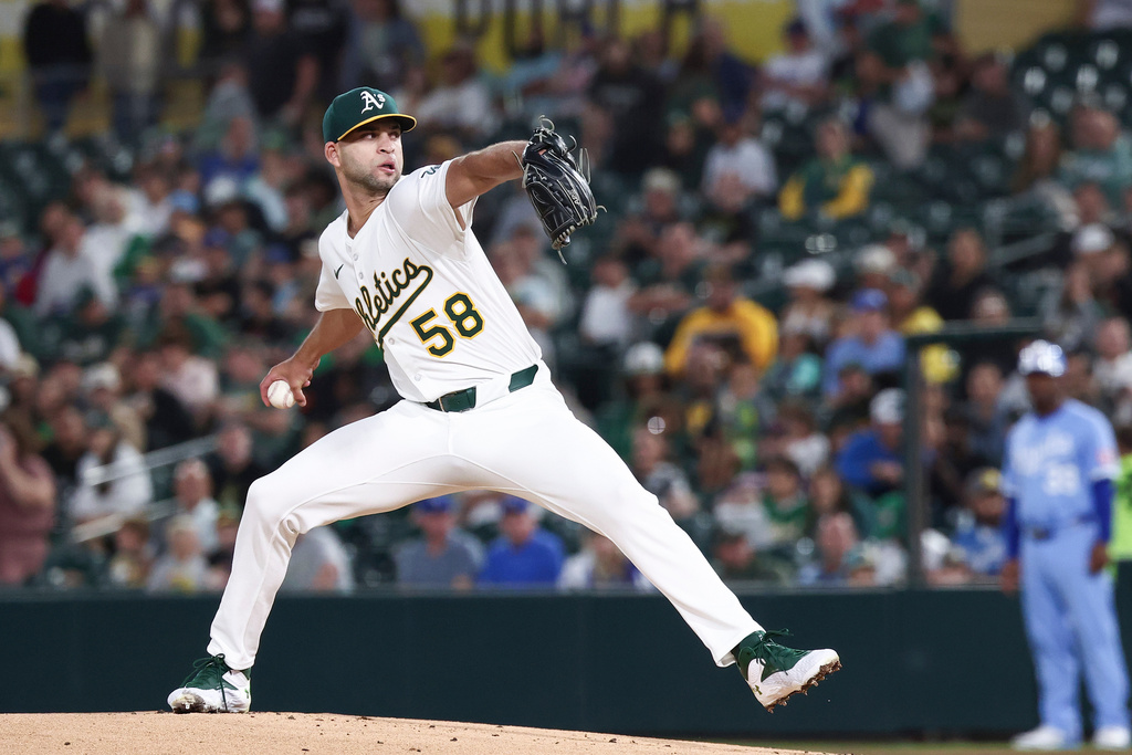 Athletics pitcher Luis Morales throws to the Kansas City Royals during the first inning of a baseball game Saturday, Sept. 27, 2025, in West Sacramento, Calif. (AP Photo/Sara Nevis)