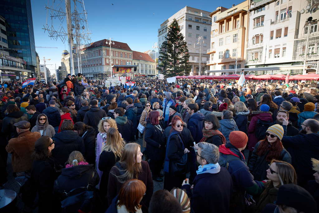 Protesters gather during a protest march against the surging far right following a spate of incidents targeting ethnic minorities and liberals, in Zagreb, Croatia, Sunday, Nov. 30, 2025. (AP Photo)