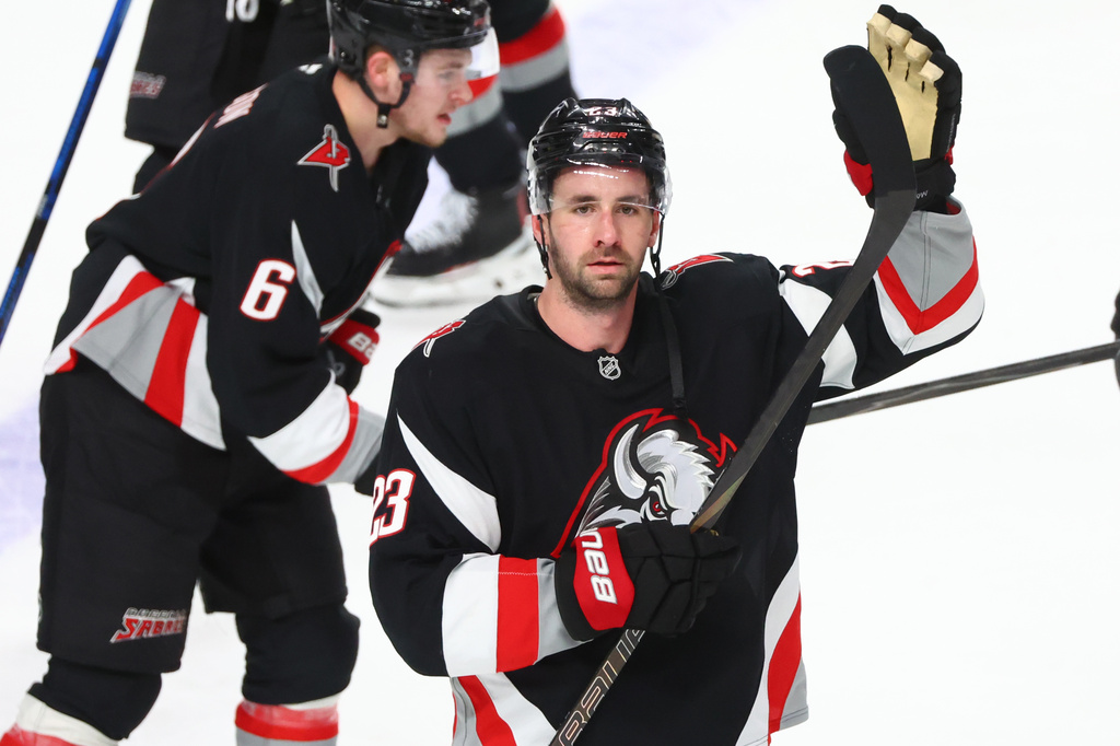 Buffalo Sabres defenseman Mattias Samuelsson (23) celebrates victory following the third period of an NHL hockey game against the Tampa Bay Lightning, Monday, April 6, 2026, in Buffalo, N.Y. (AP Photo/Jeffrey T. Barnes)