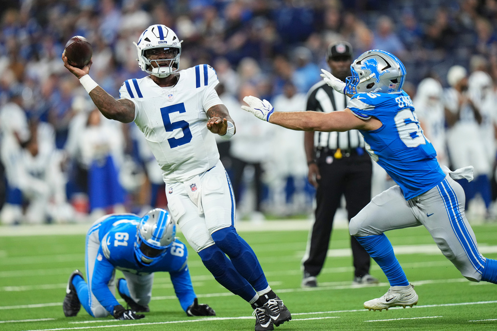 Indianapolis Colts quarterback Anthony Richardson Sr. (5) throws past Detroit Lions defensive tackle Eric O'Neill (66) during the first half of a preseason NFL football game in Indianapolis, Saturday, Aug. 29, 2026. (AP Photo/AJ Mast)