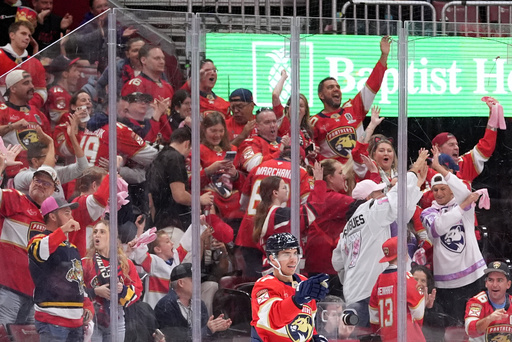 Florida Panthers center Evan Rodrigues (17) and fans celebrate after the team's first goal was scored by Florida Panthers center Sam Reinhart, not pictured, during the first period of an NHL hockey game, Saturday, Oct. 25, 2025, in Sunrise, Fla. (AP Photo/Rebecca Blackwell) Florida Panthers center Evan Rodrigues (17) and fans celebrate after the team's first goal was scored by Florida Panthers center Sam Reinhart, not pictured, during the first period of an NHL hockey game, Saturday, Oct. 25, 2025, in Sunrise, Fla. (AP Photo/Rebecca Blackwell)