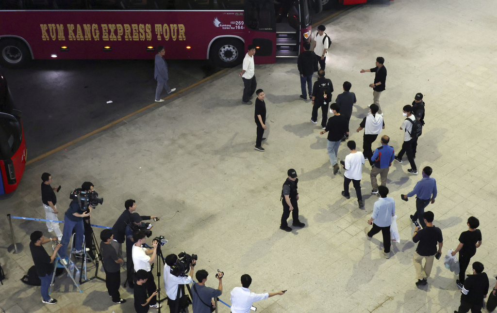South Korean workers released after days of detention in Georgia, arrive at the Incheon International Airport, in Incheon, South Korea, Friday, Sept. 12, 2025. (Yonhap via AP)