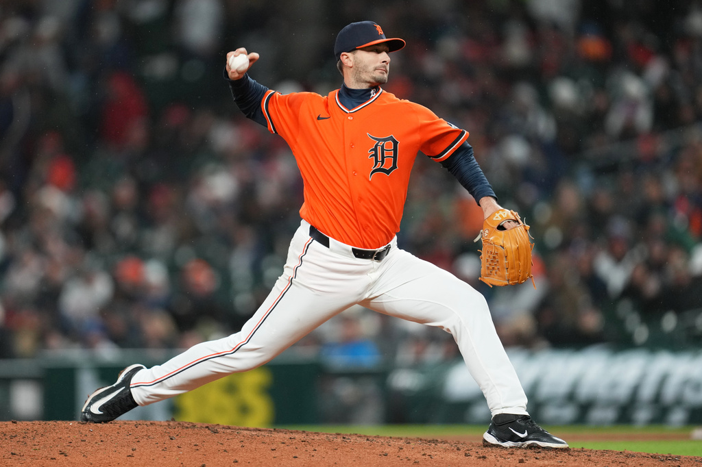Detroit Tigers pitcher Burch Smith throws against the Texas Rangers during the ninth inning of a baseball game Friday, May 1, 2026, in Detroit. (AP Photo/Paul Sancya)