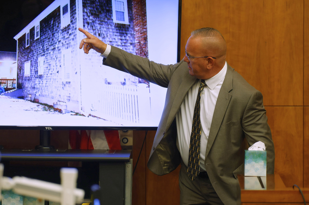 Duxbury fire department Capt. PJ Hussey points to photograph as he testifies during the murder trial for Lindsay Clancy at Plymouth Superior Court in Plymouth, Mass., on Thursday, July 30, 2026. (CJ Gunther/The Boston Herald via AP, Pool)