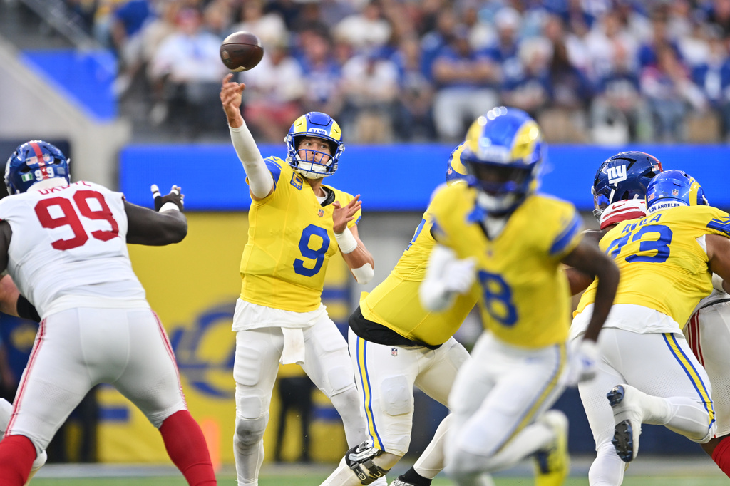 Los Angeles Rams quarterback Matthew Stafford (9) throws a pass during the first half of an NFL football game against the New York Giants in Inglewood, Calif., Monday, Sept. 21, 2026. (AP Photo/Katie Chin)
