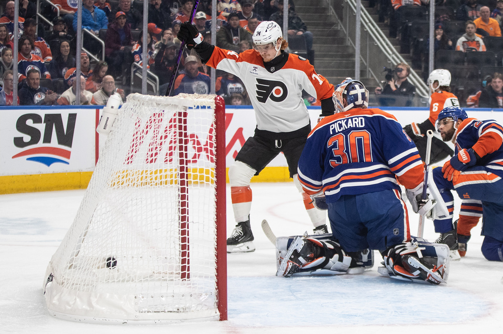 Philadelphia Flyers' Owen Tippett (74) reacts as the puck goes in past Edmonton Oilers' goalie Calvin Pickard (30) during the first period of an NHL hockey game, in Edmonton, Saturday, Jan. 3, 2026. (Jason Franson/The Canadian Press via AP)