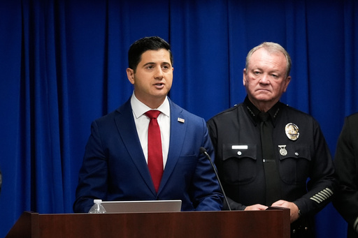 Acting U.S. Attorney Bill Essayli, left, speaks next to Los Angeles Police Chief Jim McDonnell during a news conference announcing an arrest made in the Palisades Fire, Wednesday, Oct. 8, 2025, in Los Angeles. (AP Photo/Damian Dovarganes) Acting U.S. Attorney Bill Essayli, left, speaks next to Los Angeles Police Chief Jim McDonnell during a news conference announcing an arrest made in the Palisades Fire, Wednesday, Oct. 8, 2025, in Los Angeles. (AP Photo/Damian Dovarganes)