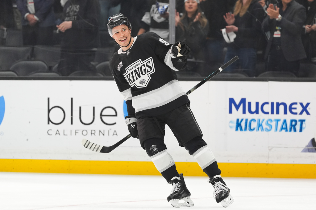 Los Angeles Kings left wing Andrei Kuzmenko (96) celebrates his goal during the first period of an NHL hockey game against the Seattle Kraken Wednesday, Feb. 4, 2026, in Los Angeles. (AP Photo/Jae C. Hong)