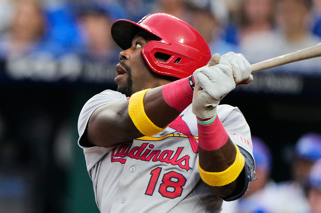 St. Louis Cardinals' Jordan Walker watches his sacrifice fly to score one run during the first inning of a baseball game against the Kansas City Royals, Friday, June 19, 2026, in Kansas City, Mo. (AP Photo/Charlie Riedel)
