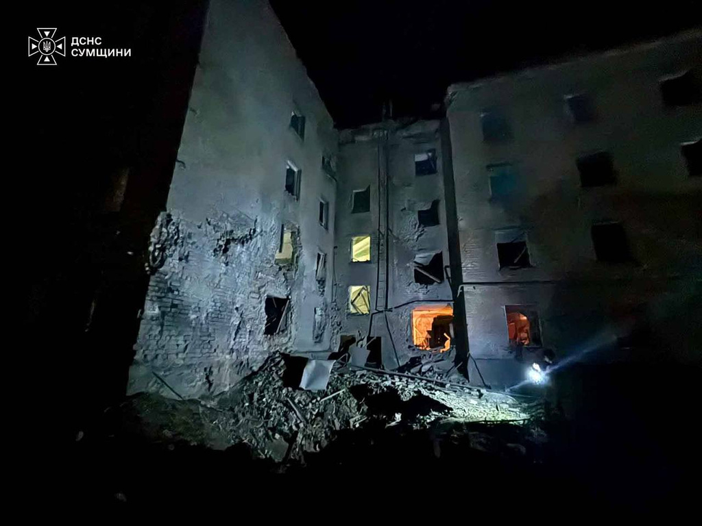 In this photo provided by the Ukrainian Emergency Service, a residential building is damaged following a Russian air attack in Sumy, Ukraine, Thursday, Aug. 6, 2026. (Ukrainian Emergency Service via AP)