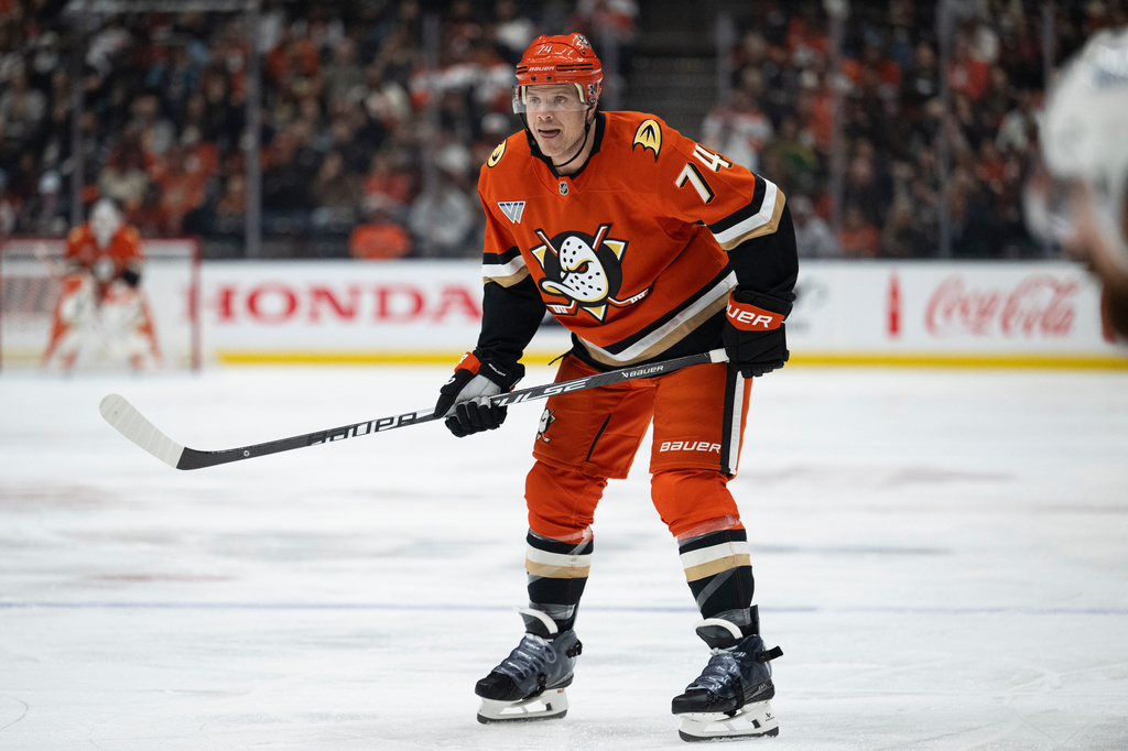 FILE - Anaheim Ducks defenseman John Carlson takes his stance during an NHL hockey game against the Vancouver Canucks, April 12, 2026, in Anaheim, Calif. (AP Photo/Kyusung Gong, File)