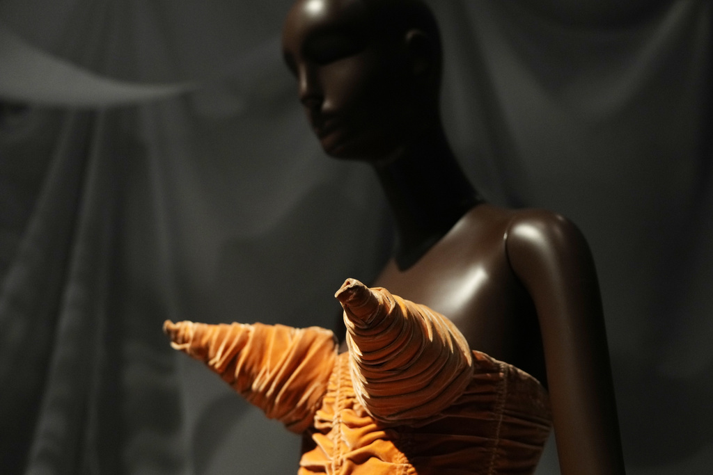 A cone-bra dress designed by Jean Paul Gaultier is displayed during a press preview for the exhibit "Dress, Dreams and Desire: Fashion and Psychoanalysis" on Tuesday, Sept. 9, 2025, at The Museum at FIT in New York. (Photo by Charles Sykes/Invision/AP)