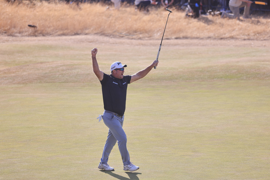 Ryan Fox of New Zealand celebrates on the 18th green after winning the British Open Golf championships at Royal Birkdale golf club, in Southport, England, Sunday, July 19, 2026. (AP Photo/Peter Morrison)