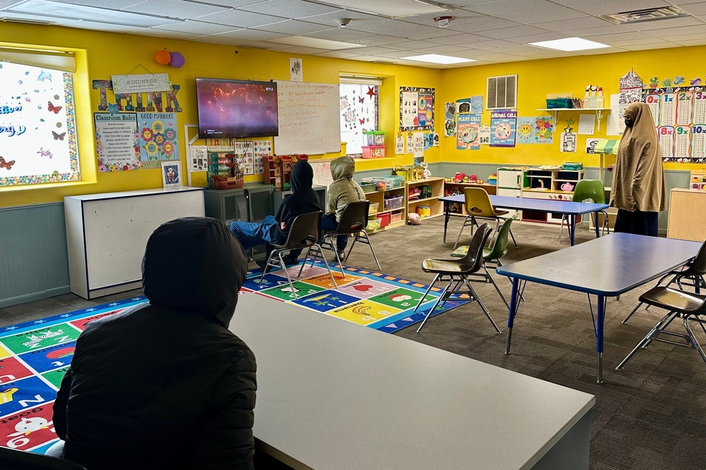 Children watch television at ABC Learning Center in Minneapolis, Minn., on Wednesday, Dec. 31, 2025. (AP Photo/Mark Vancleave)