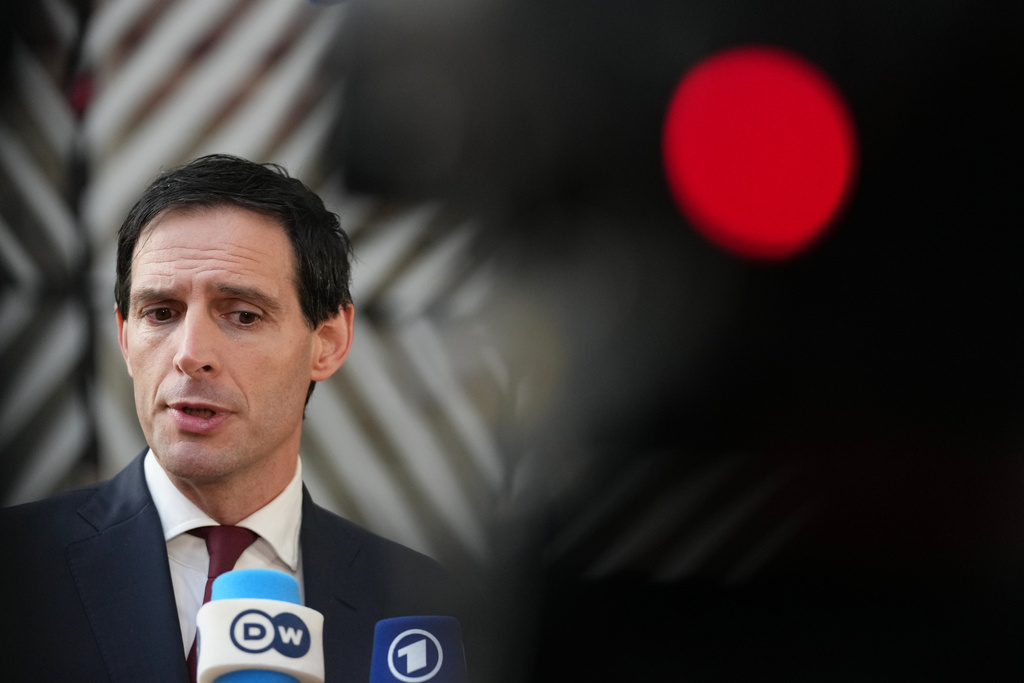 European Commissioner for Climate, Net-Zero and Clean Growth Wopke Hoekstra speaks with the media as he arrives for a meeting of EU Environment ministers at the European Council building in Brussels, Belgium, Tuesday, Nov. 4, 2025. (AP Photo/Virginia Mayo)