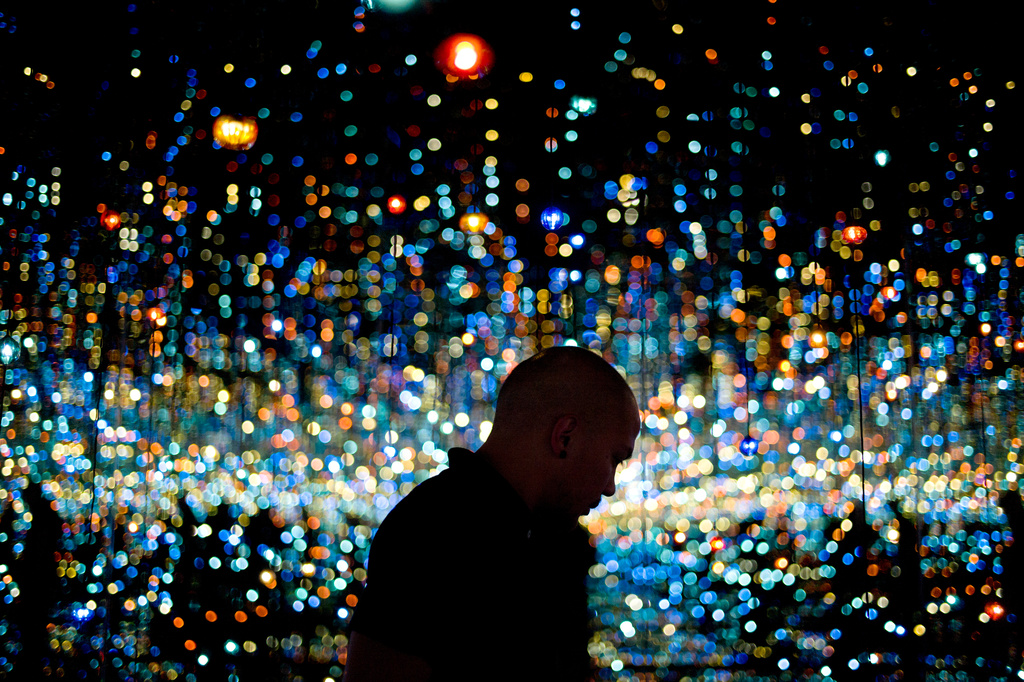 FILE - Redan Magbanua views Yayoi Kusama's Infinity Mirrored Room at the Broad museum, Tuesday, Nov. 10, 2015, in downtown Los Angeles. The contemporary art museum founded by philanthropist Eli Broad opened in September. (AP Photo/Jae C. Hong, File)