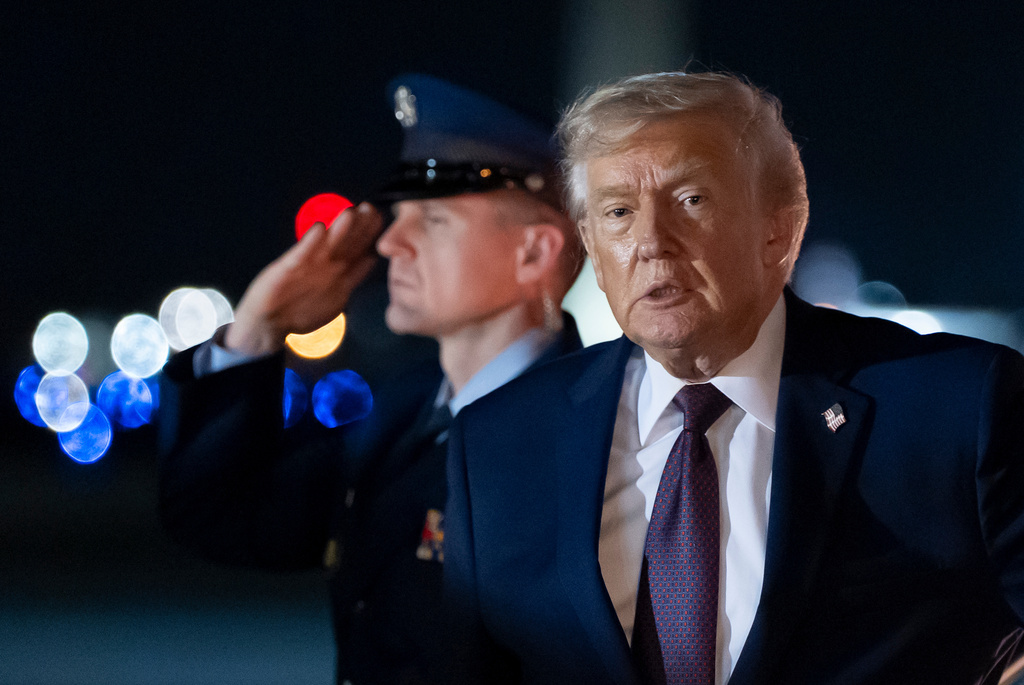 President Donald Trump arrives on Air Force One at Palm Beach International Airport, Saturday, Dec. 20, 2025, in West Palm Beach, Fla. (AP Photo/Alex Brandon)