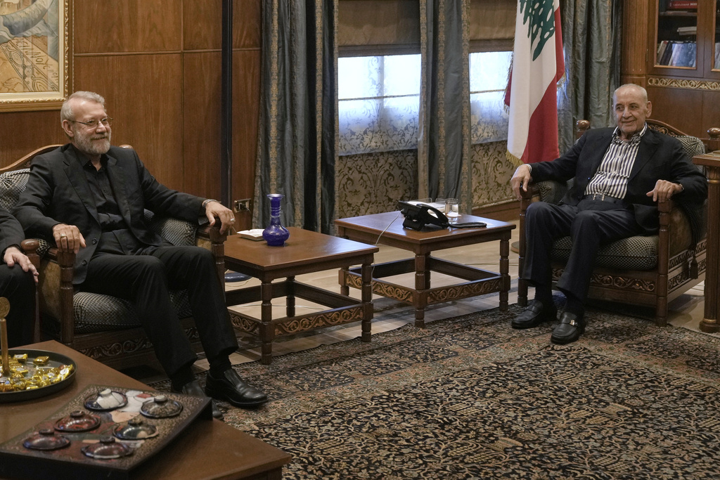 Iranian Secretary of Supreme National Security Council Ali Larijani, left, meets with the Lebanese Parliament Speaker Nabih Berri, in Beirut, Lebanon, Wednesday, Aug. 13, 2025. (AP Photo/Bilal Hussein)