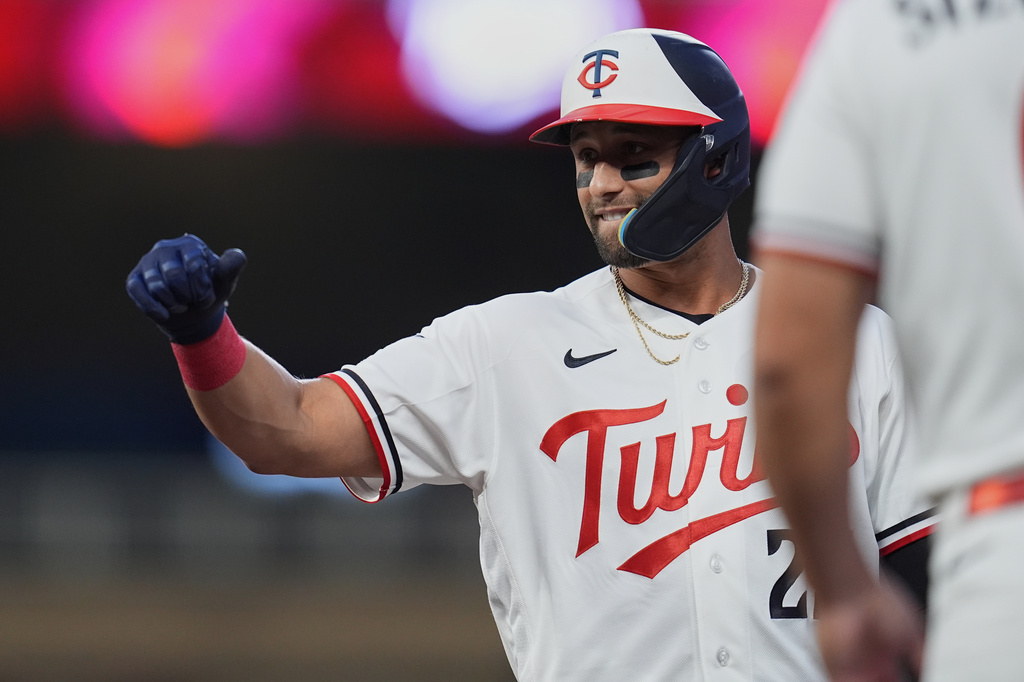 Minnesota Twins' Royce Lewis celebrates after hitting a RBI single during the first inning of a baseball game against the Atlanta Braves, Monday, Aug. 17, 2026, in Minneapolis. (AP Photo/Abbie Parr)