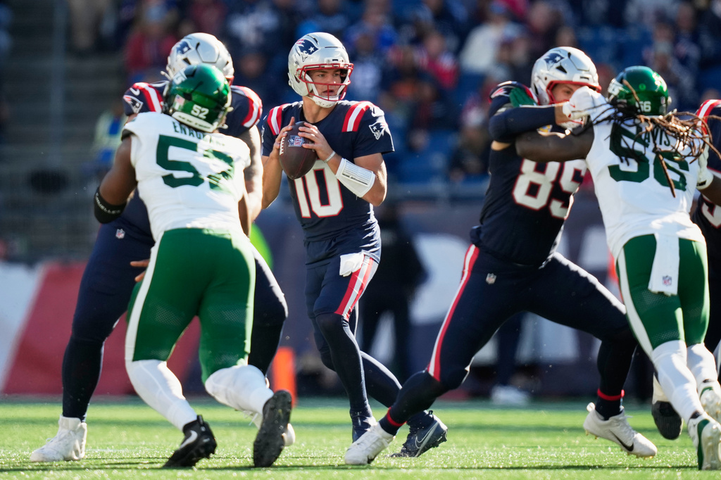 New England Patriots quarterback Drake Maye (10) stands back to pass during the second half of an NFL football game against the New England Patriots in Foxborough, Mass., Sunday, Oct. 18, 2026. (AP Photo/Charles Krupa)