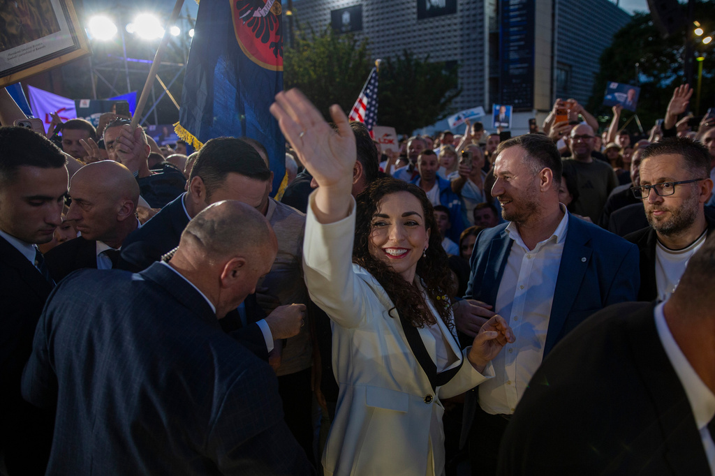 Vjosa Osmani, Kosovo former president, waves to supporter at the closing political rally of the Democratic League of Kosovo (LDK), in capital Pristina on Friday, June 5, 2026. (AP Photo/Visar Kryeziu)