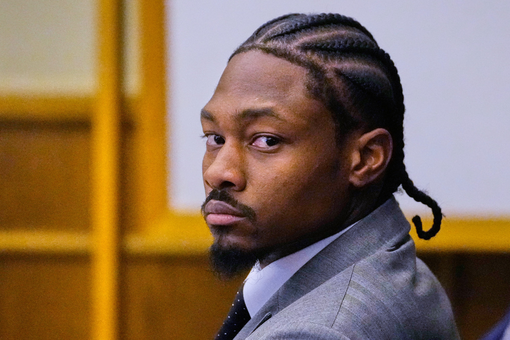 Former New England Patriots wide receiver Stefon Diggs listens to his defense attorney cross examine witness Jamila Adams during his trial at Norfolk County District Court, Tuesday, May 5, 2026, in Dedham, Mass. (AP Photo/Charles Krupa, Pool)