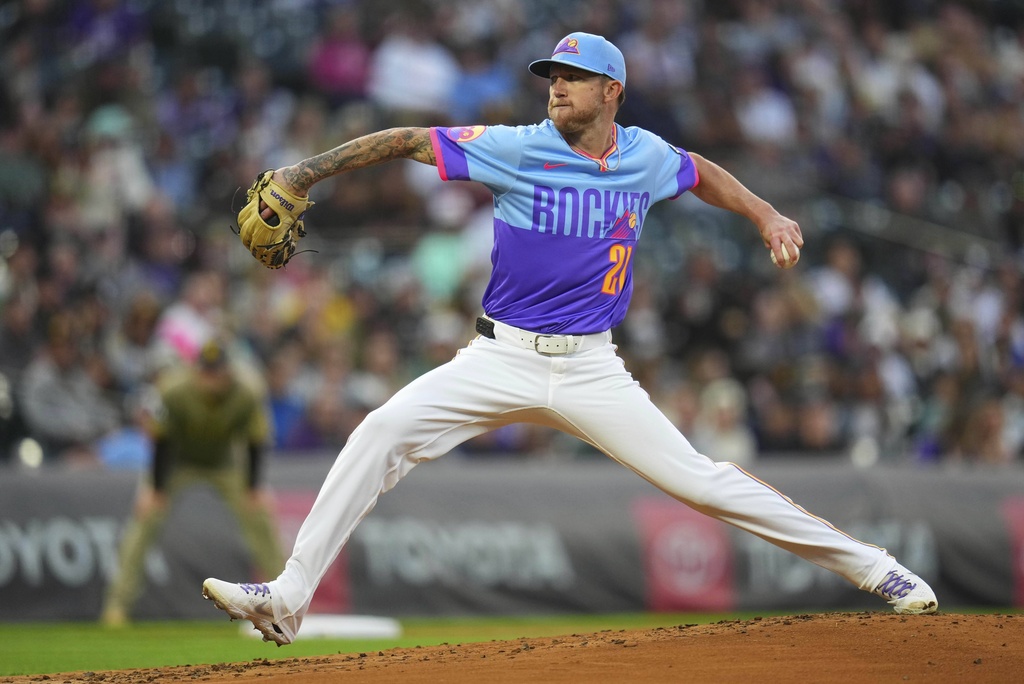 Colorado Rockies' starting pitcher Kyle Freeland throws to the plate against the San Diego Padres during the second inning of a baseball game Friday, Sept. 5, 2025, in Denver. (AP Photo/Jack Dempsey)
