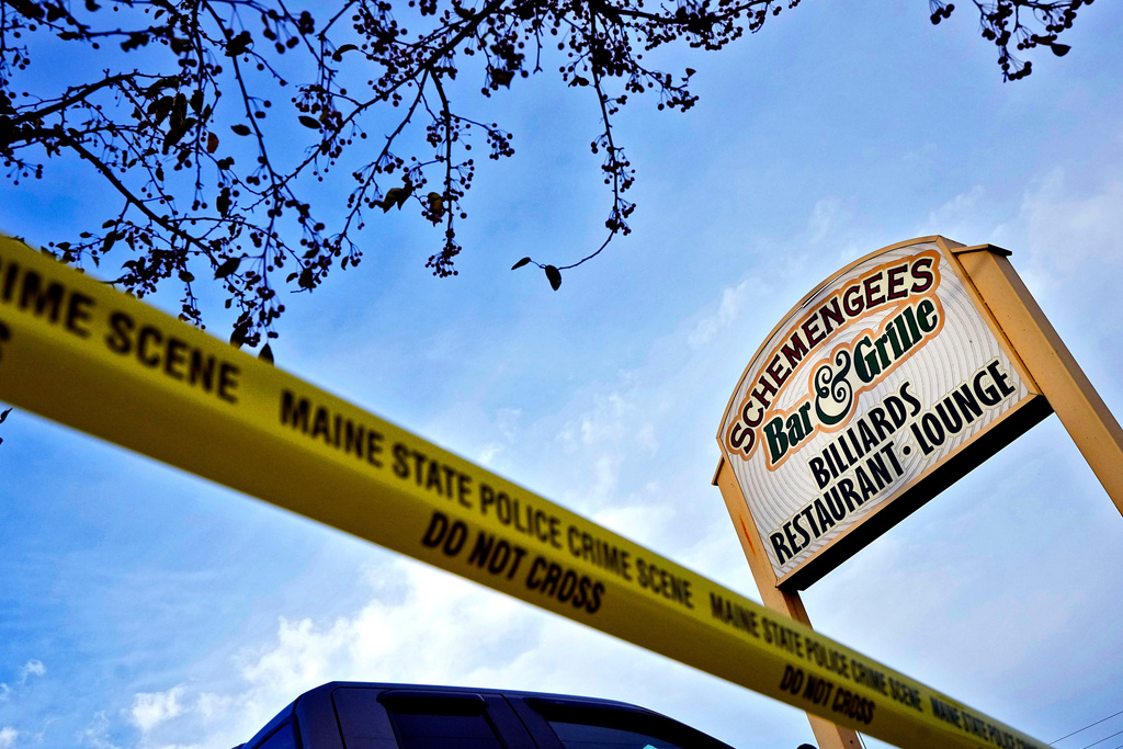 FILE - Crime scene tape still surrounds Schemengees Bar & Grille, Sunday, Oct. 29, 2023, in Lewiston, Maine. (AP Photo/Matt York)