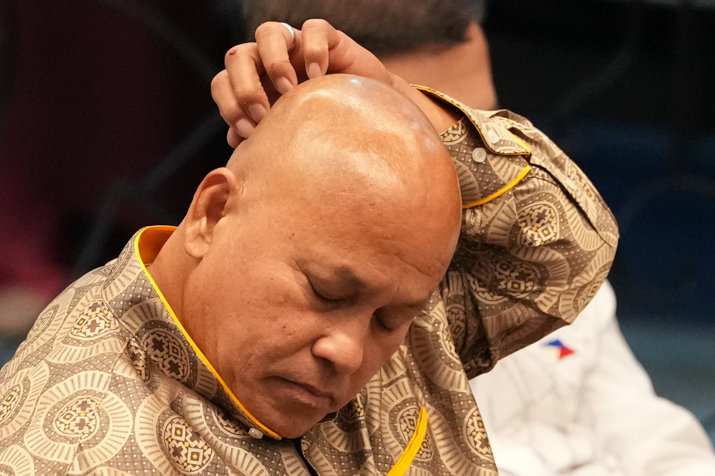 Philippine Senator Ronald dela Rosa gestures during a session at the Philippine Senate in Pasay, Philippines on Wednesday, May 13, 2026. (AP Photo/Aaron Favila)