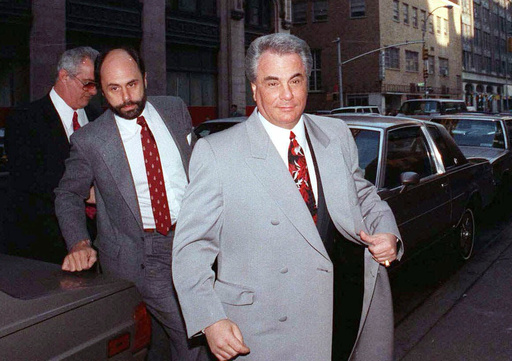 FILE - John Gotti, right, arrives at court with his attorney Attorney Gerald Schargel, center, and his brother Peter Gotti, left, on Feb.9, 1990, in New York. (AP Photo/David Cantor, File) FILE - John Gotti, right, arrives at court with his attorney Attorney Gerald Schargel, center, and his brother Peter Gotti, left, on Feb.9, 1990, in New York. (AP Photo/David Cantor, File)